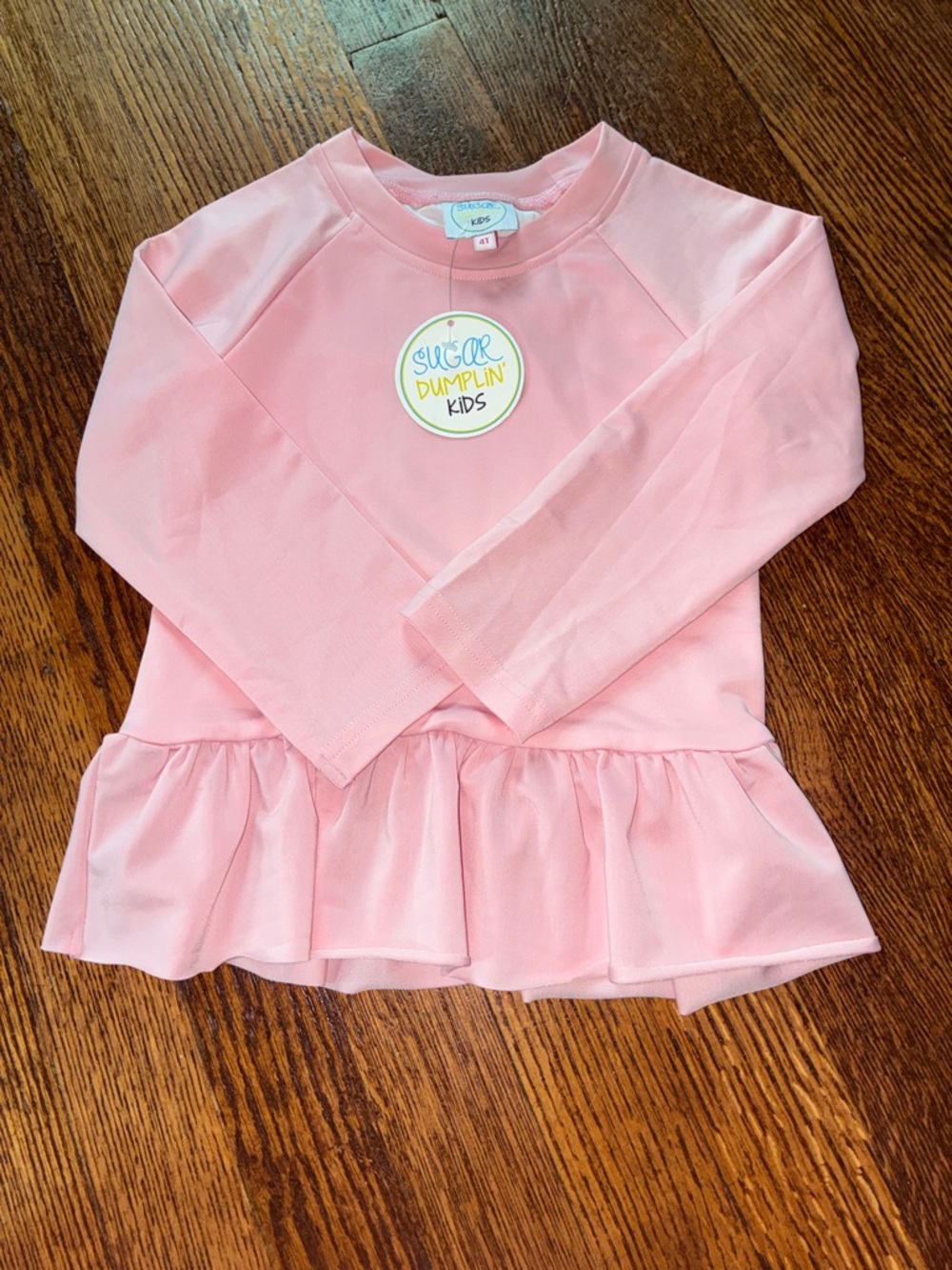 Pink Long-Sleeve Rashguard with Peplum Hem